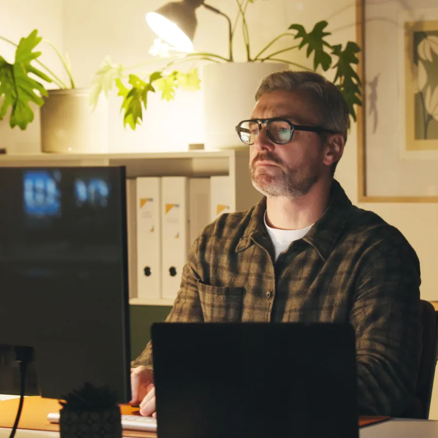 An operator setting up their business at a desk